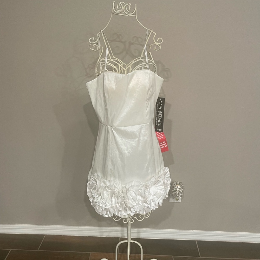 This is a cute short  dress.  Be the bell of the ball.